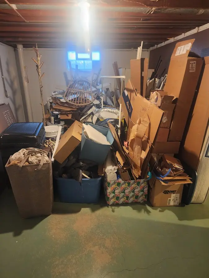 Roll-off dumpster container at job site for 2 Yard Dumpster Rental in Port Wentworth