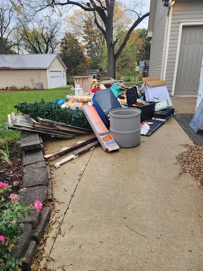Dumpster being loaded with debris for Demolition Dumpster Rental in Port Wentworth